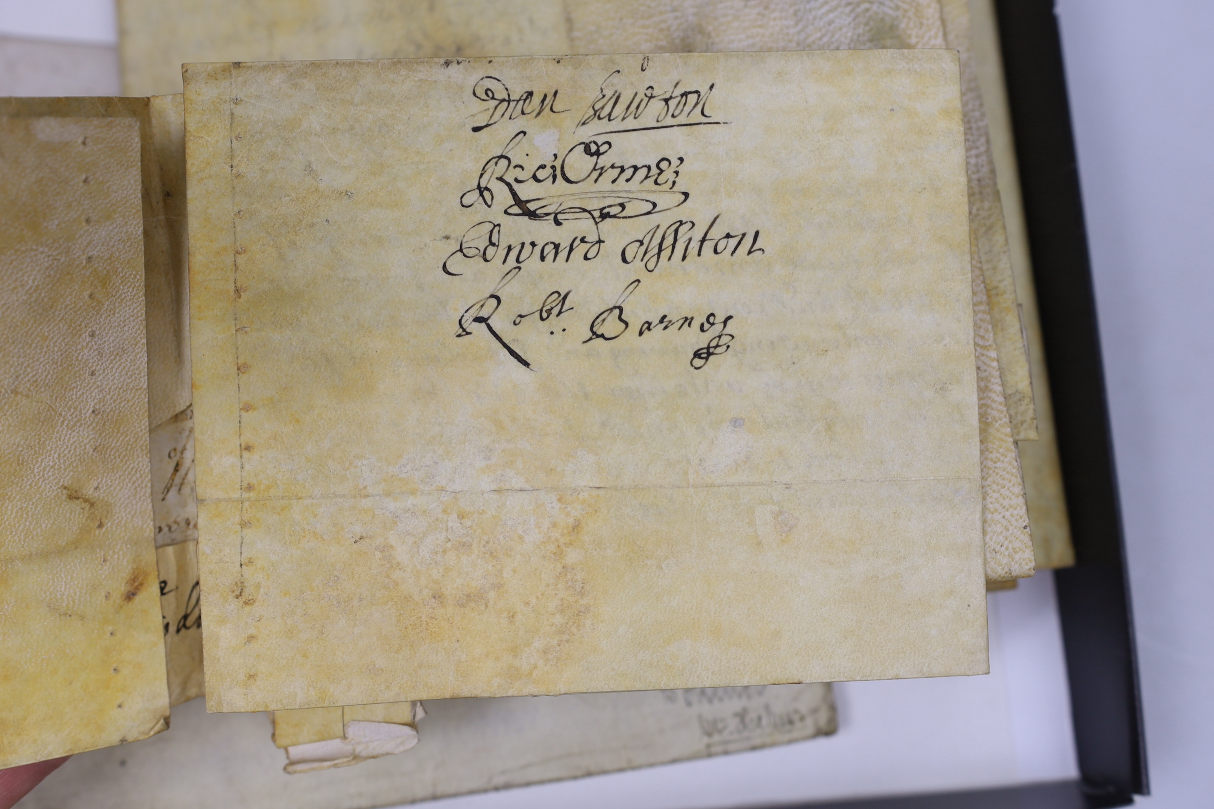 A letter on Buckingham Palace headed note paper an envelope, a will of 1891, a 1742 indenture, another dated 1692